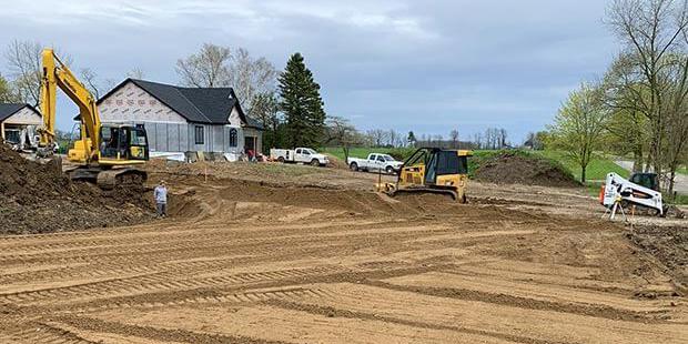 Grading at a residential construction site.